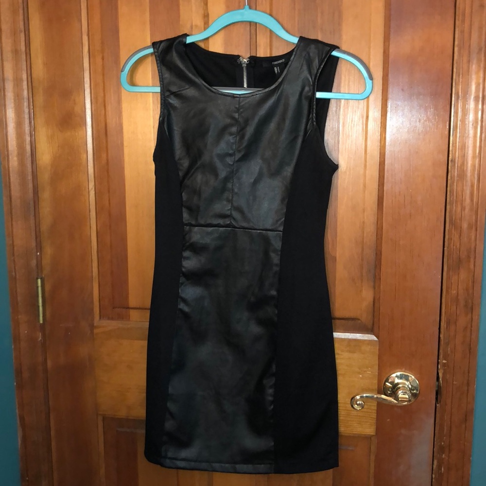 Faux leather and cut out little black dress